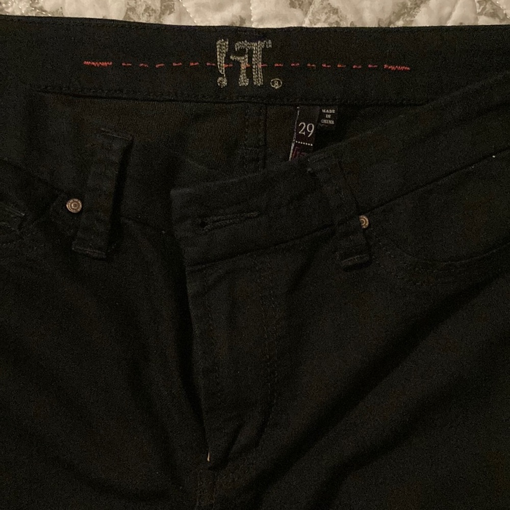Black skinny jeans with pockets on side of legs